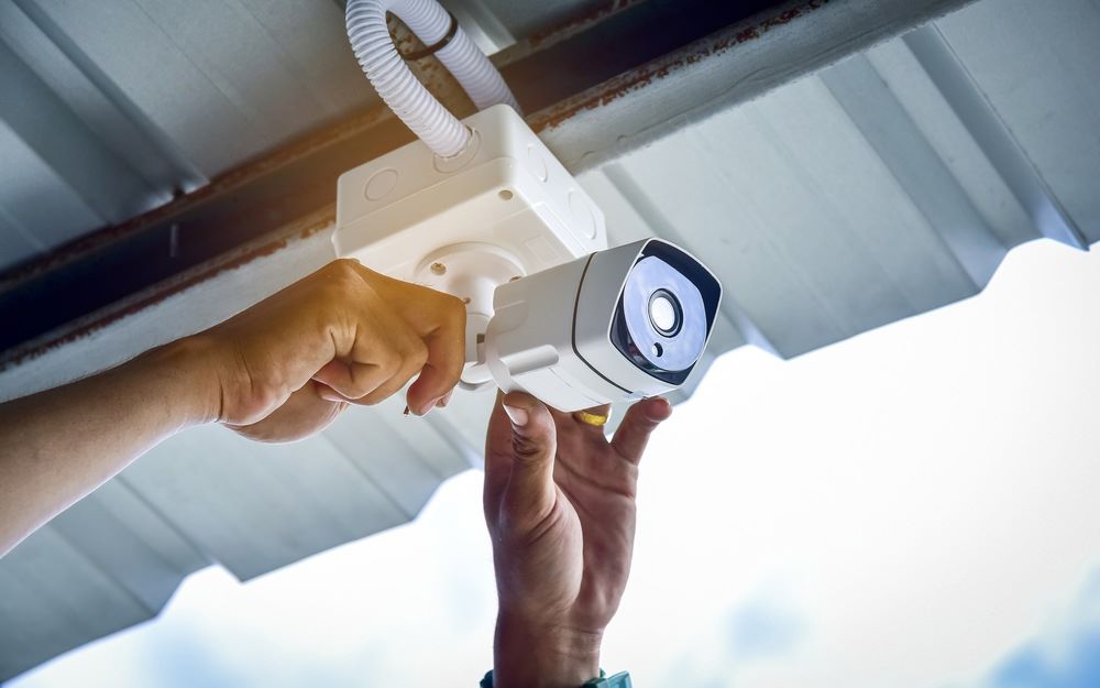 Two modern cctv security cameras on concrete wall Two modern cctv security cameras on concrete wall